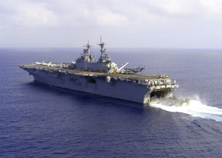Illustration for article titled US Navy sailors inside an amphibious assault ship—or a lost Aliens scene